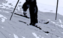 a man's feet on skiis