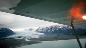 plane wing and view of glacier